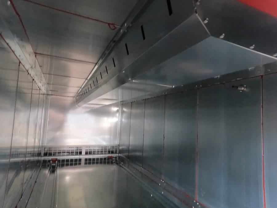 Booth interior with galvanised panels and ceiling air supply duct